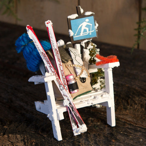 A mini Adirondack ski themed chair.