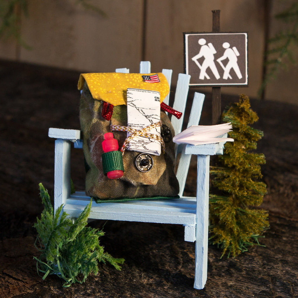 A mini Adirondack hiker themed chair.